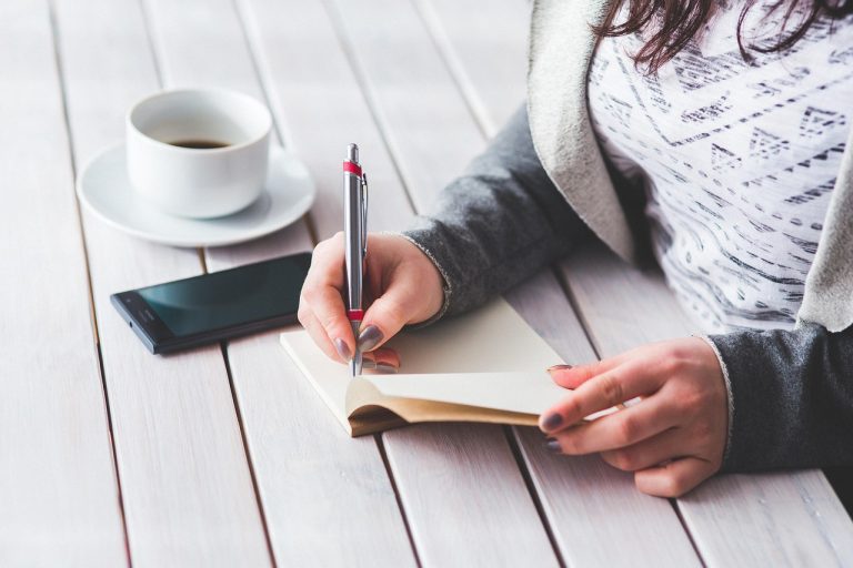 Woman, write, notepad — Crypto News Highlights Covering Global Blockchain Innovation