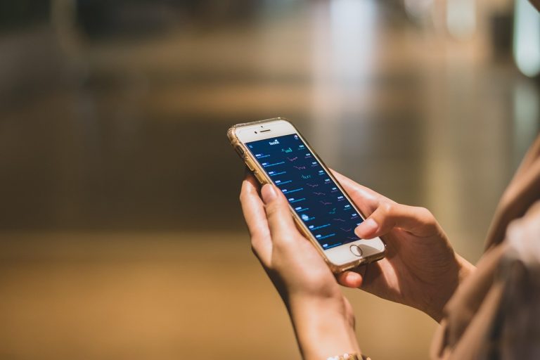 Business, smartphone, hands — Reach DJs, Curators, and Tastemakers with Music Promotion Services